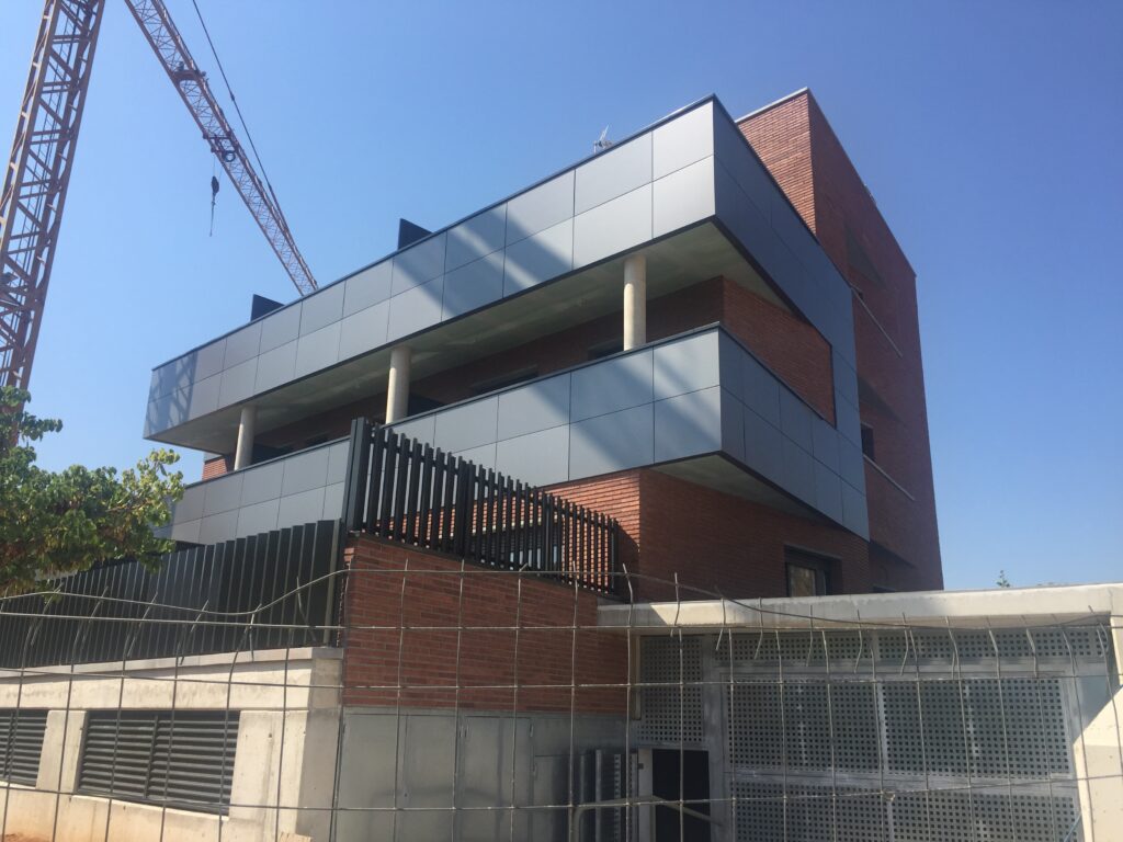 a building with a crane behind it